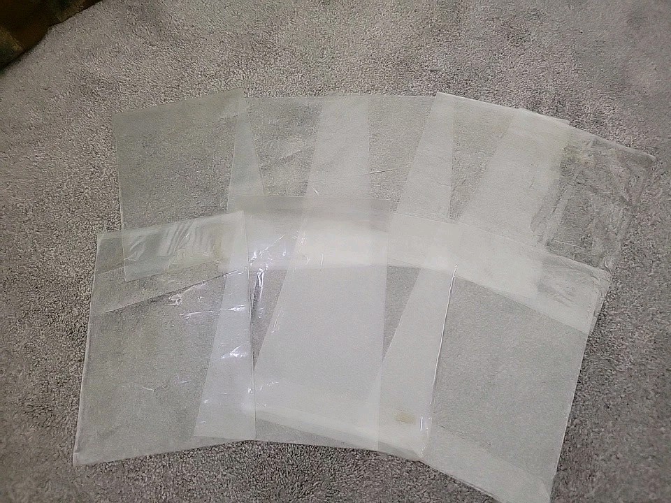 9 Comic Book Resealable  Sleeves - Used