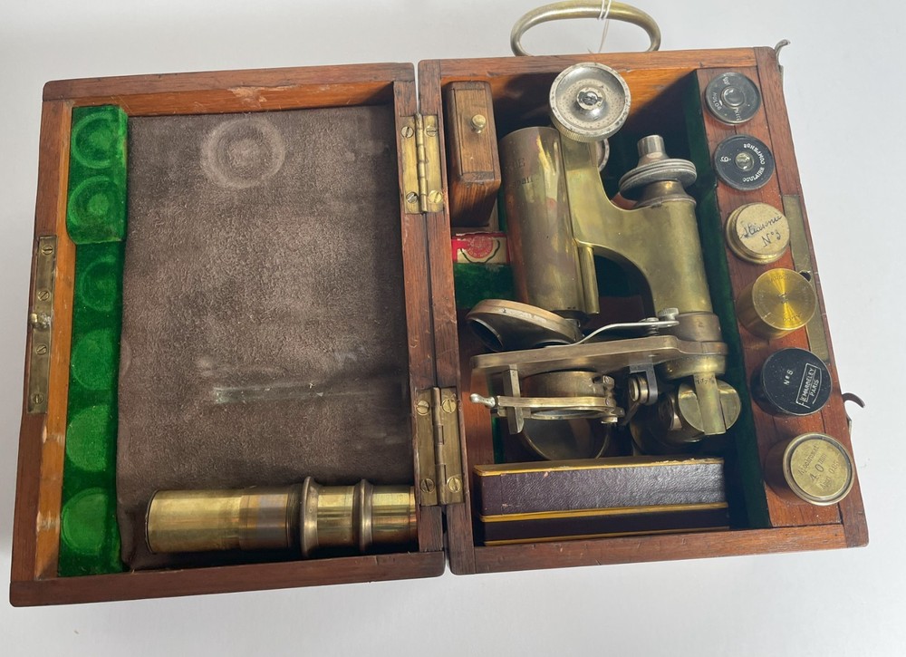 Cased Stiassnie Microscope with accessories