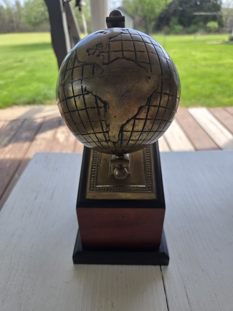 Brass Globe Bookend with wood base. One