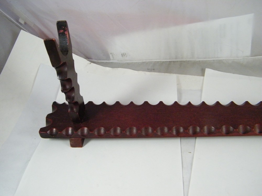 ORNATE PLASTIC SAMURAI SWORD WITH FOO DOG HANDLE AND STAND