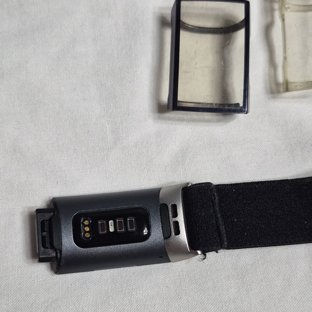 Fitbit Activity Tracker with Multiple Bands, Charging Cable, Protective Covers