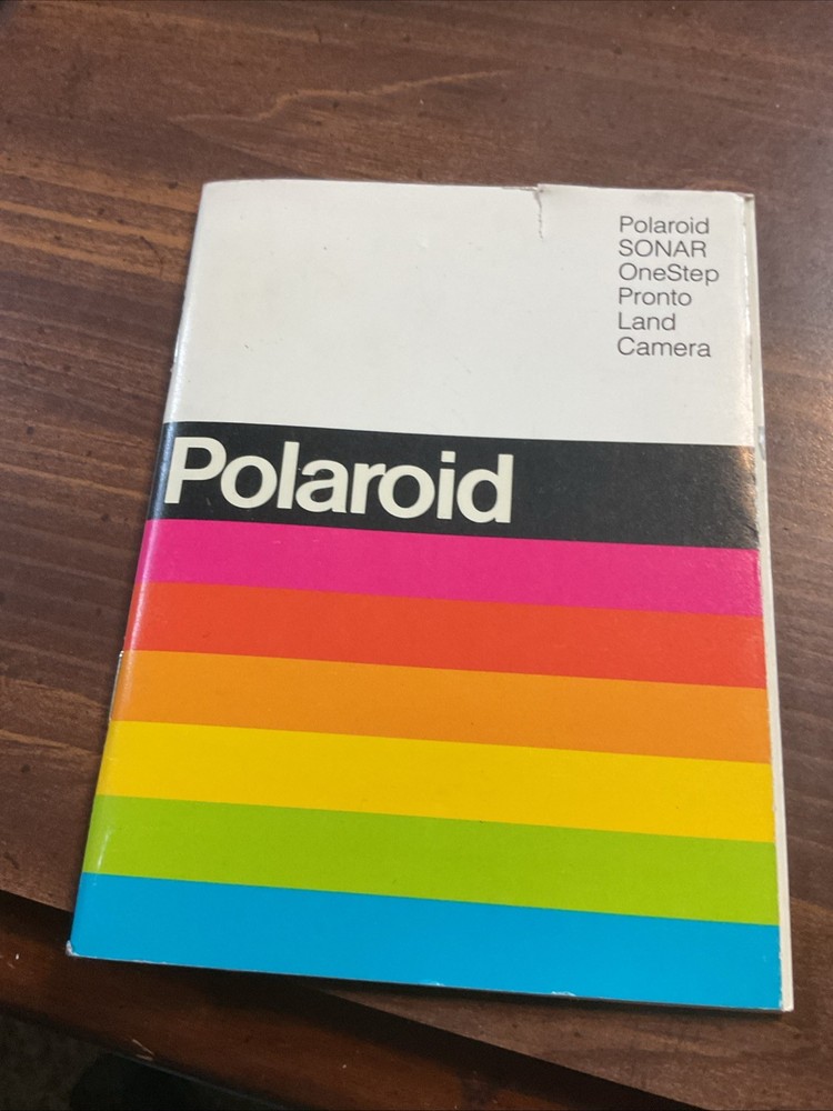 Polaroid Sonar One Step Camera With Model PR-50 And Book And Case untested