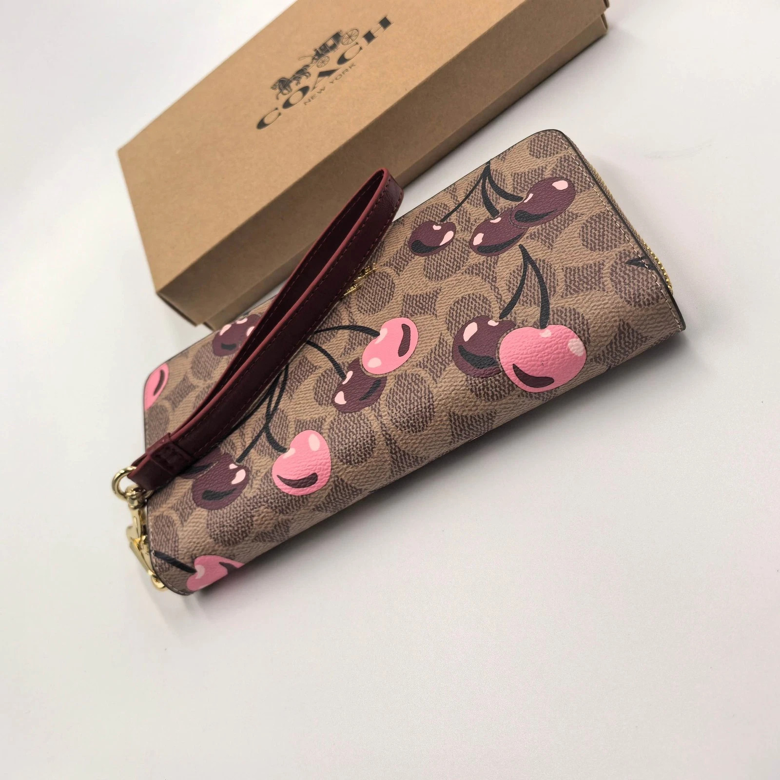 2026 COACH Long Zip Around Wallet In Signature Canvas With Cherry Print CZ328