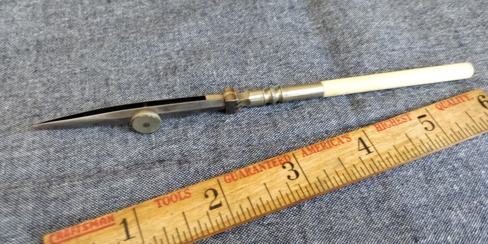 Vintage drafting Pen with white handle Bone?