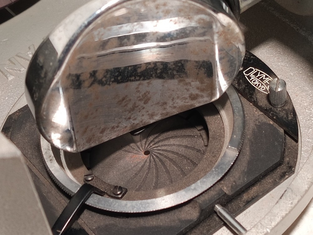 Olympus Tokyo microscope base w/ iris diaphragm, rotating stage, mirror shown