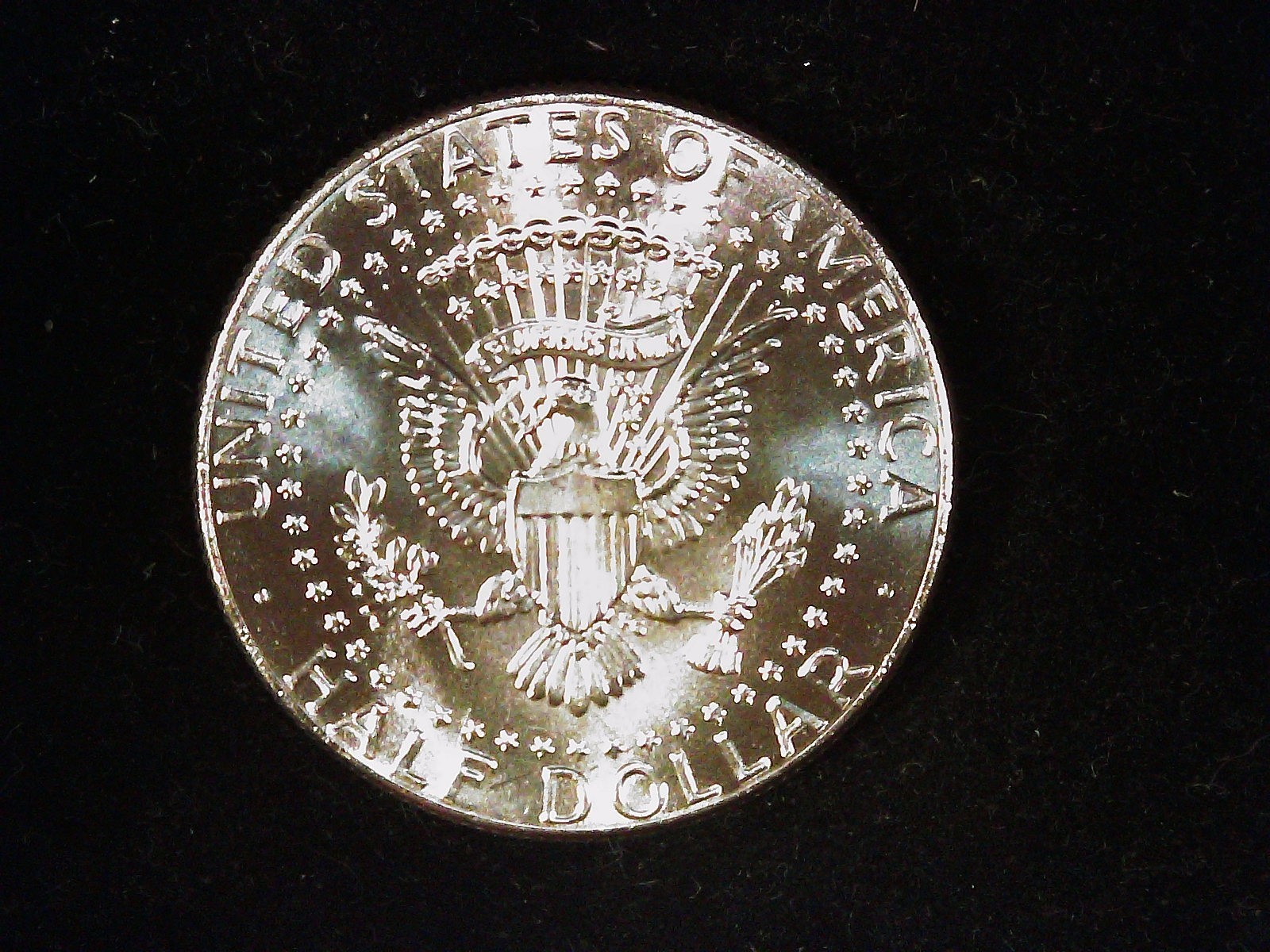 2025-D Kennedy Half Dollar Roll BU (1). Heads/Tails.