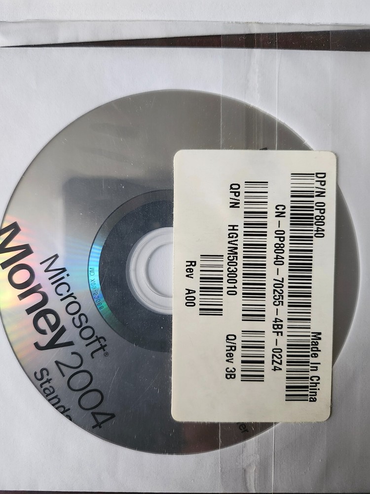 assorted computer installation and program discs