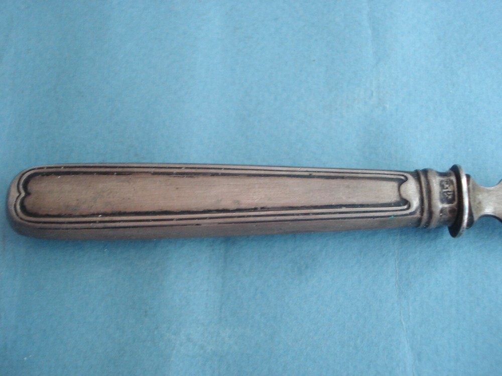 Butter knife. Silver 800 test.
