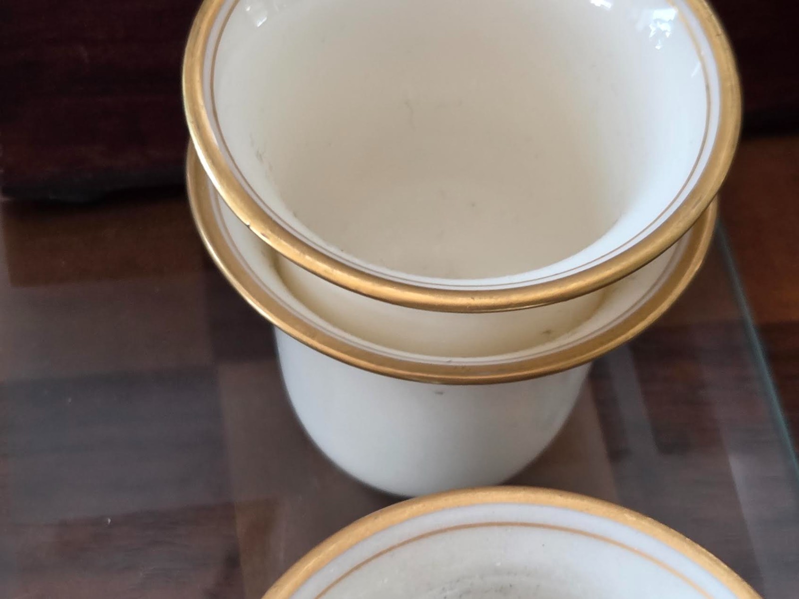 A Pair of Sterling Silver Teacups with 6 Porcelain Inserts