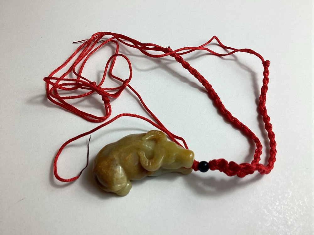 Brown 2 Sided Jadeite Ox Translucent Pendant