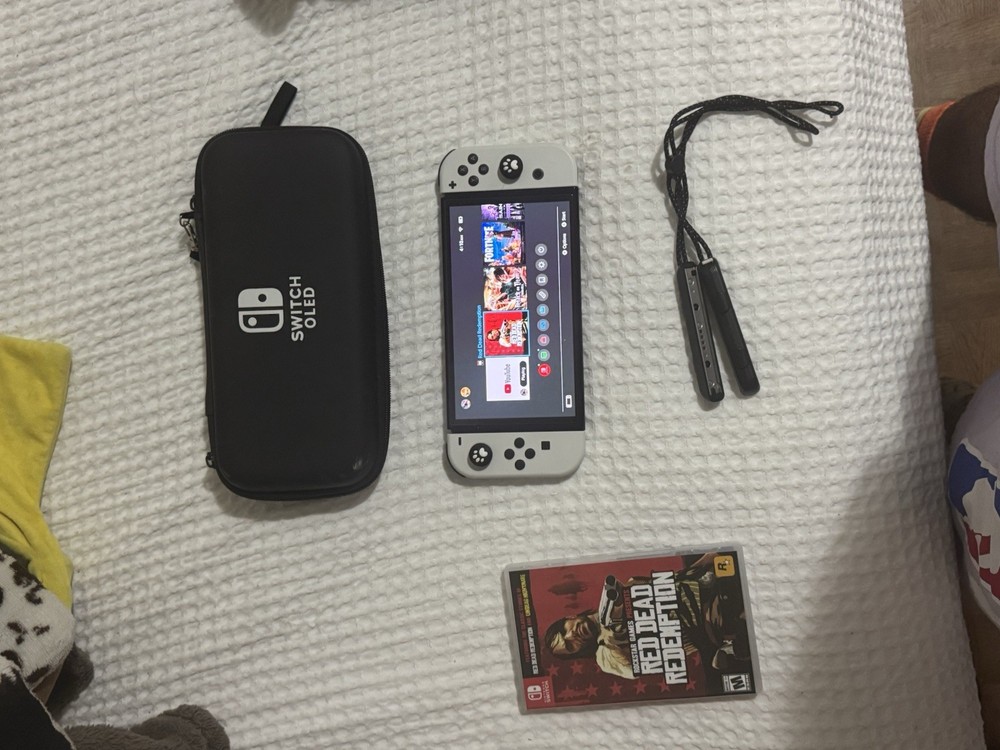 Nintendo Switch OLED Bundle with Red Dead Redemption, Carrying Case, Joy-Cons