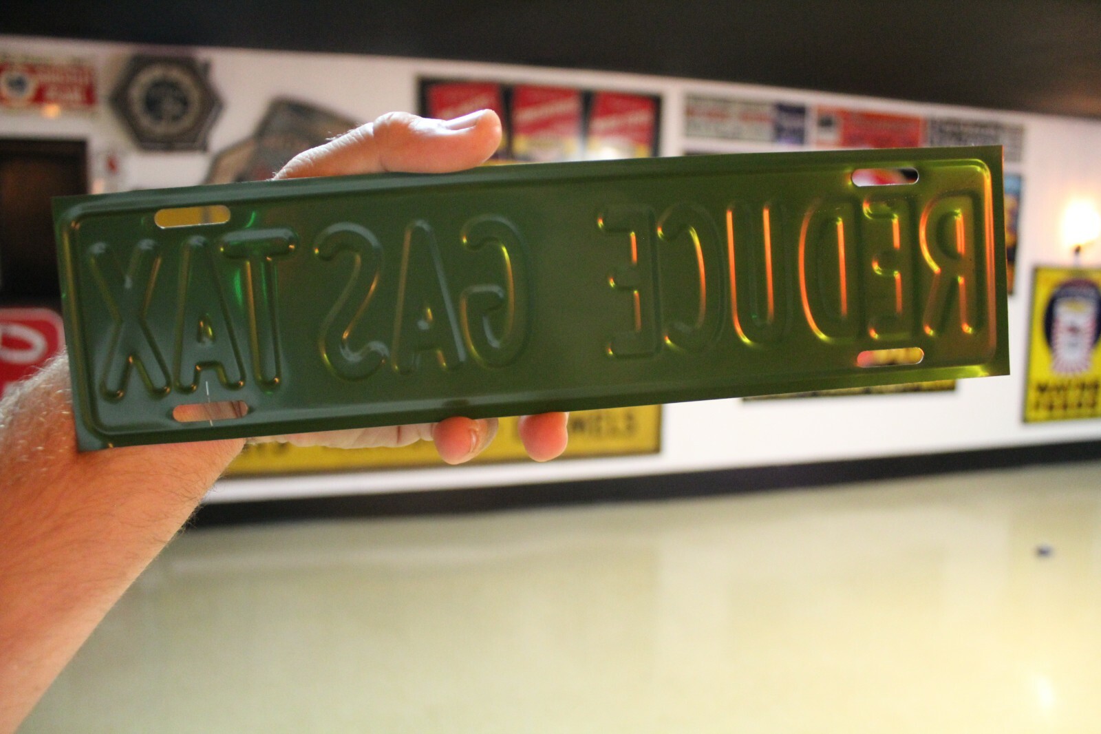 RARE REDUCE THE GAS TAX PLATE TOPPER EMBOSSED METAL SIGN SALES GAS OIL FORD