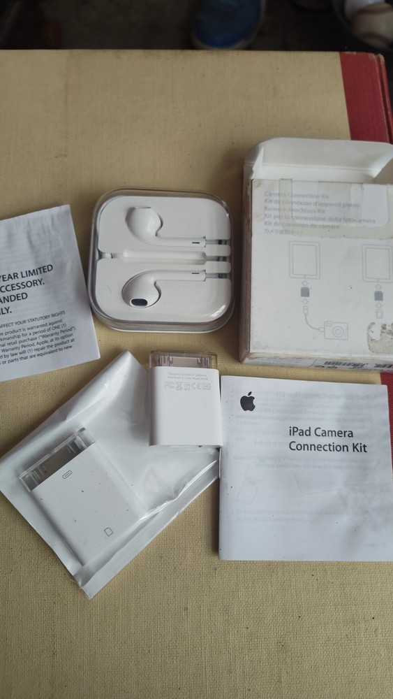 apple ipad camera connection kit + earbuds