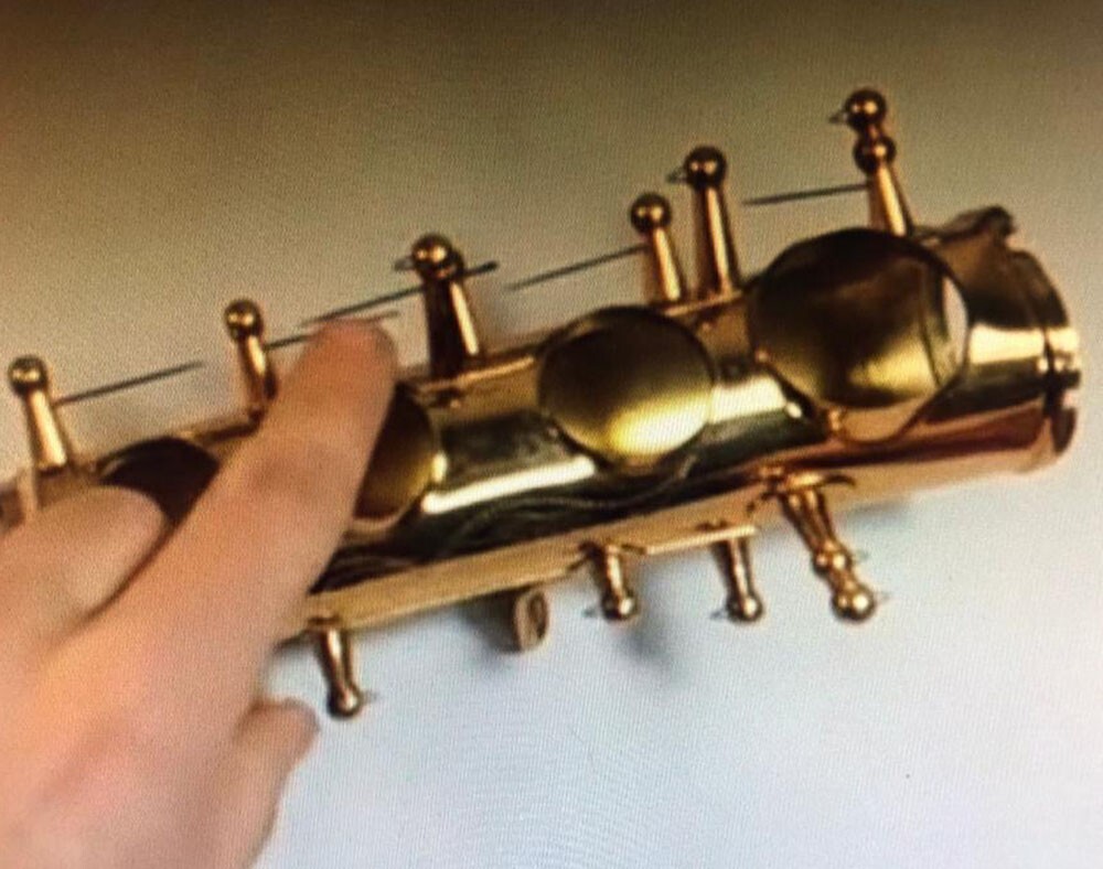 PARALLEL ACTION SPRING INSERTING PLIERS FEATURE FOR WOODWIND MUSIC INSTRUMENTS