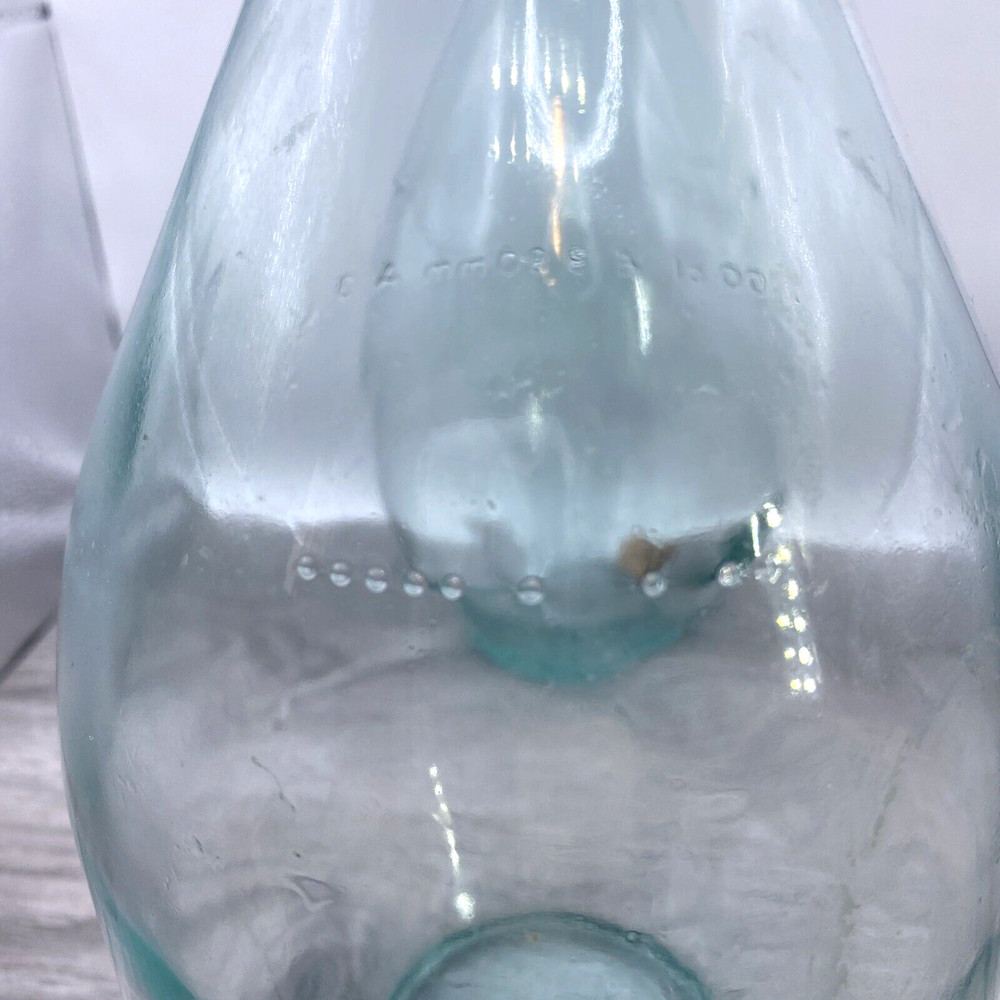 Two old wine bottles - 1 Cork inside - Label Residue