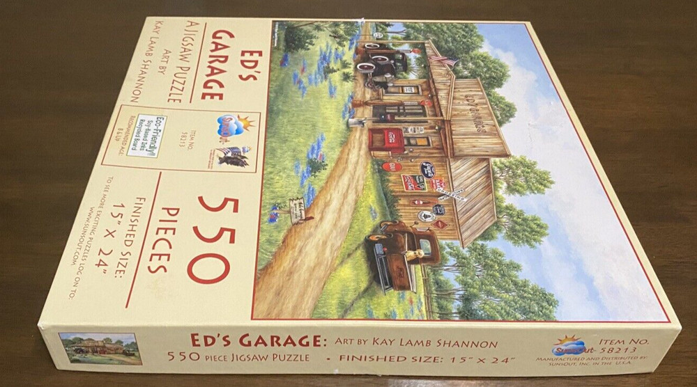 550 pc. SunsOut Ed's Garage Puzzle 2019