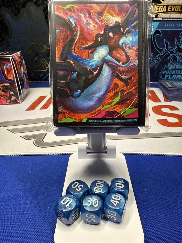 Sealed Mega Charizard UPS Sleeves and Unplayed Dice