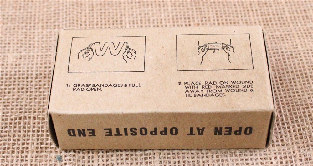 9052 - WWII era Field Dressing 4 x 7 inches - unopened