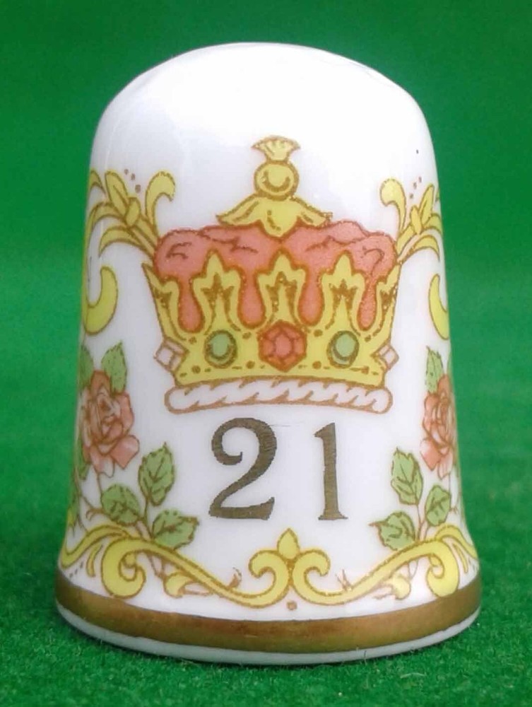 9 CAVERSWALL BONE CHINA THIMBLES.