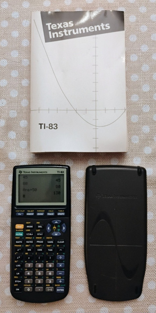 Texas Instruments TI-83 Graphing Calculator and Guidebook - Very Nice!