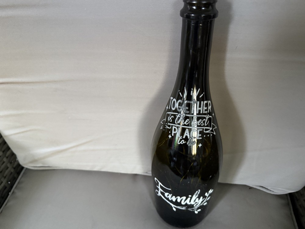Lighted wine bottle with on/off switch in cork.