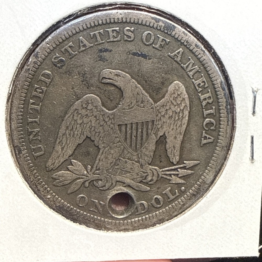 1846 Seated Liberty Dollar Holed.
