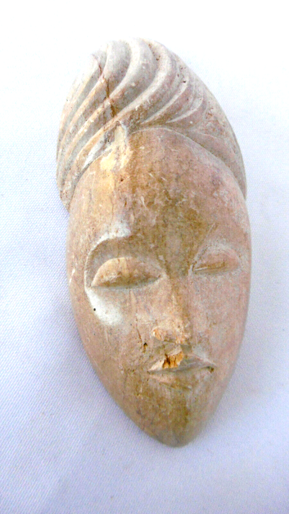 Face Carved IN Stone