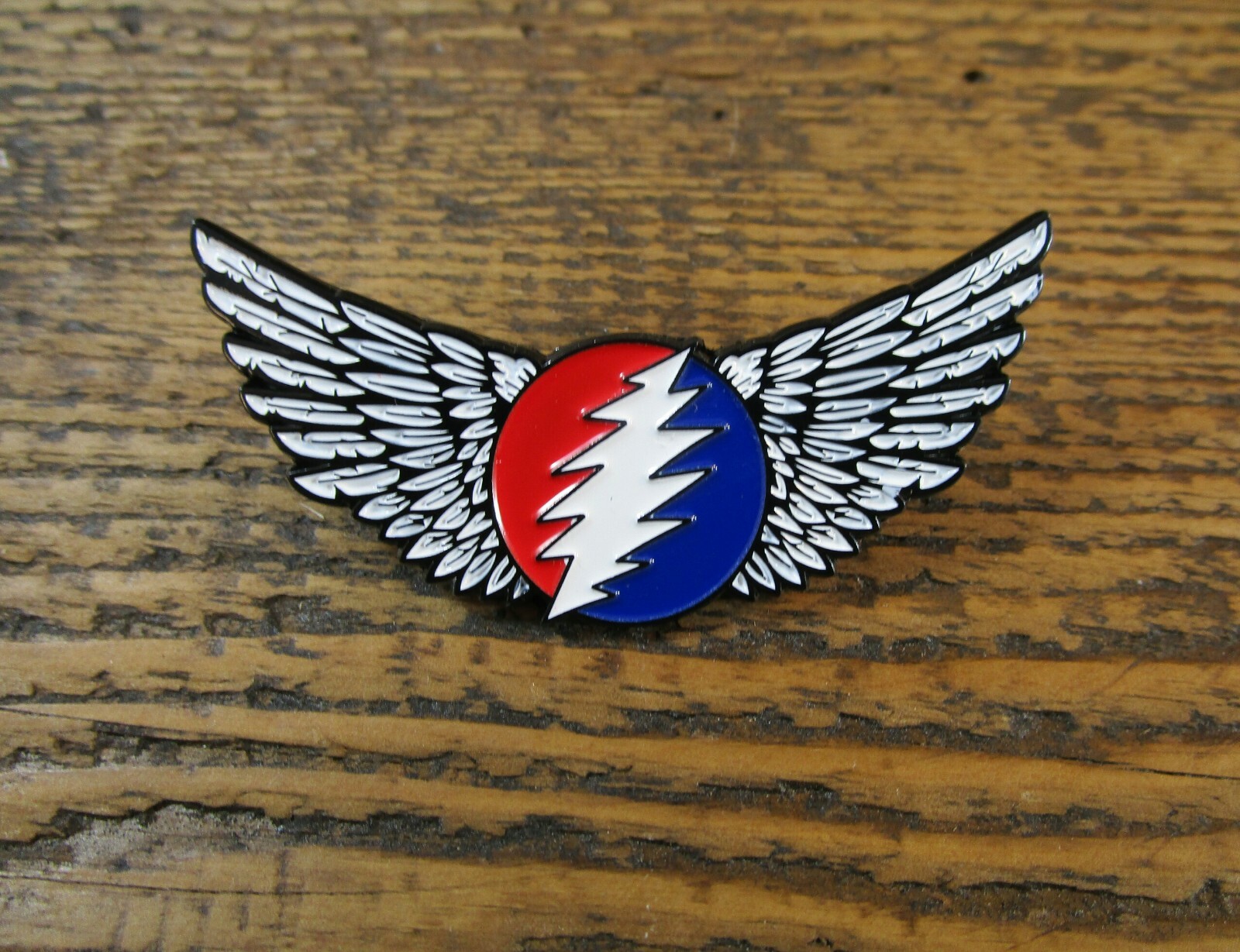 Grateful Dead pin.  Winged Stealie.