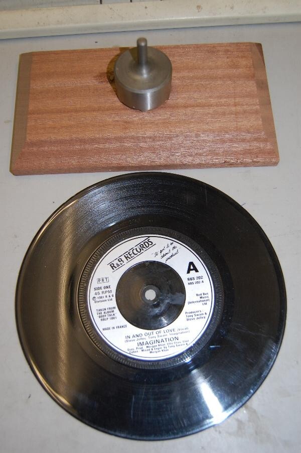 Dinker for jukebox records --cuts clean accurate holes easily.