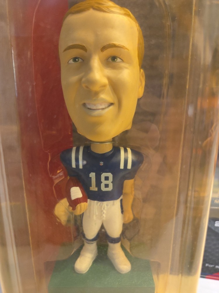 Peyton Manning Bobblehead Play Makers by Upper Deck includes collectible card