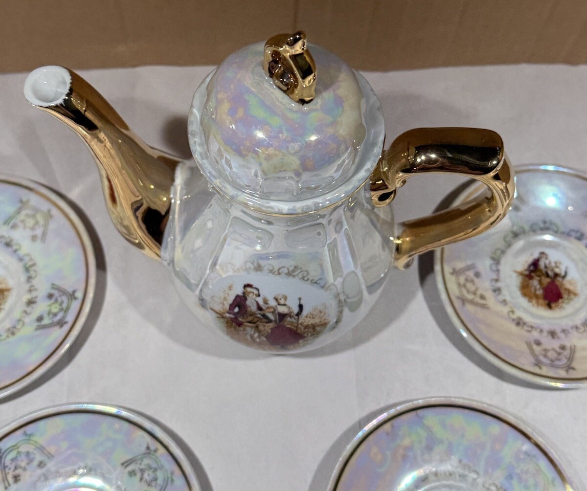 Romeo And Juliet Tea Pot 4 Tea Cups 4 Saucers Gold Trim Handles Iridescent White