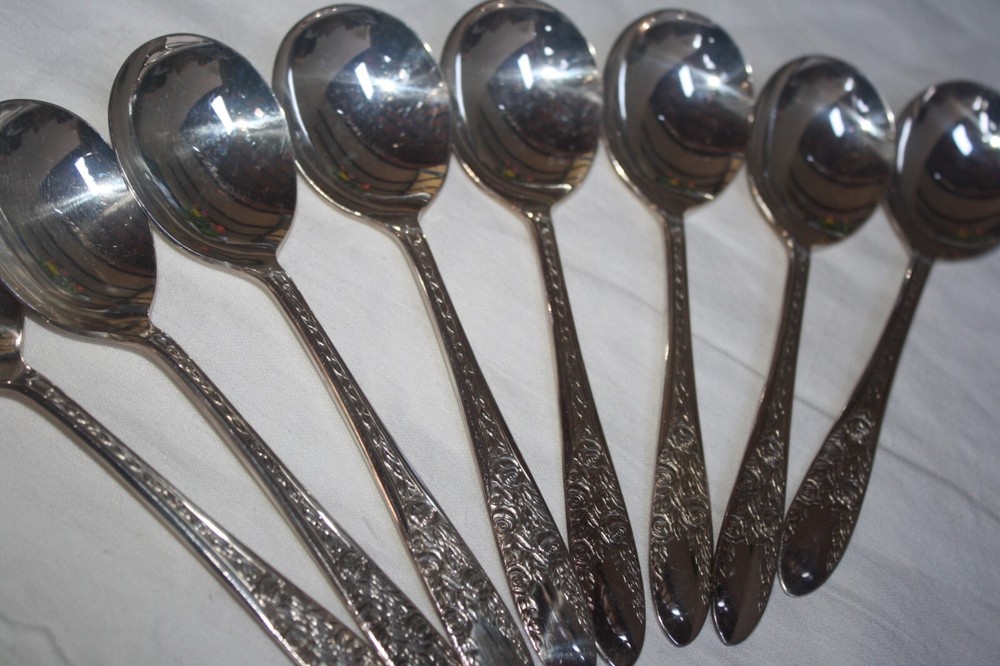 NATIONAL SILVER CO. SILVER PLATED FLATWARE "ROSE & LEAF" (8) CREAM SOUP SPOONS