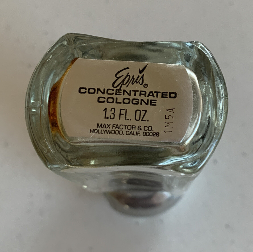 EPRIS BY MAX FACTOR 1.3 OZ NO BOX DENTS IN TOP EMPTY