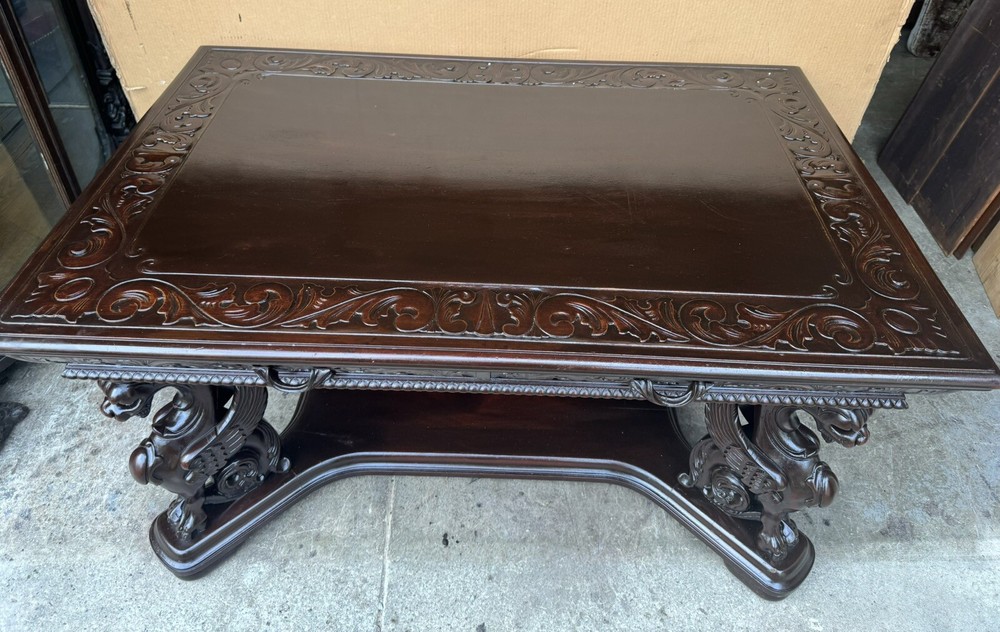 R. J. HORNER CARVED WING GRIFFIN LIBRARY TABLE