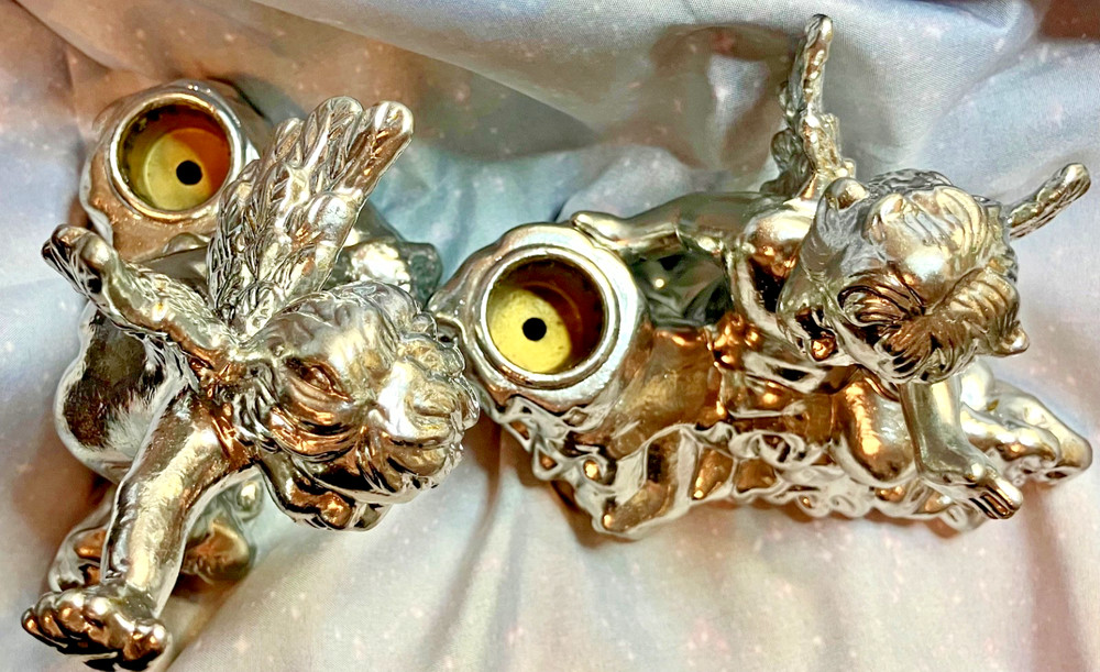 Two Silver Colored Ceramic Baby Cherub Candlestick Holders