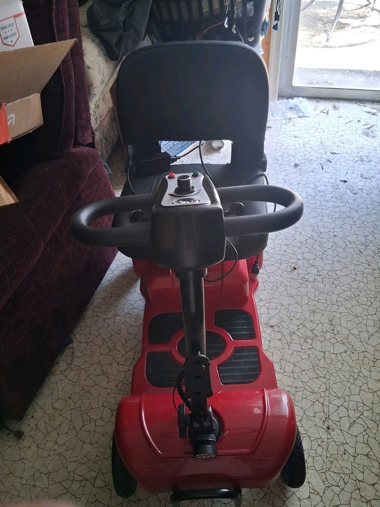 Red Mobility Scooter.
