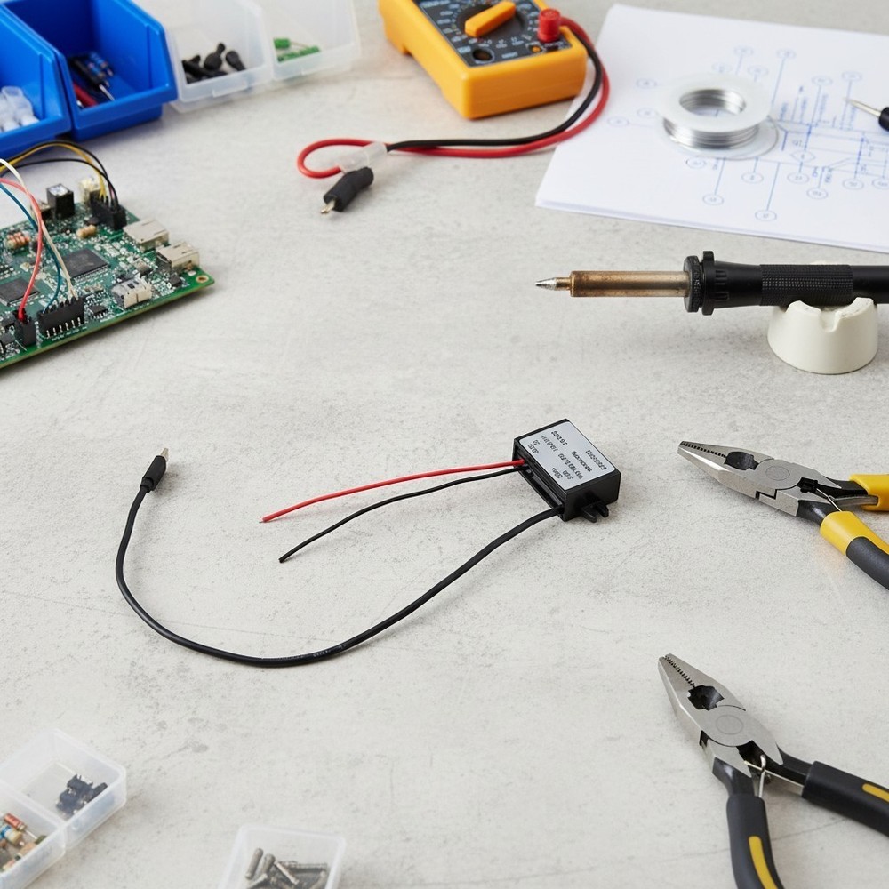 Easily Charge Your Portable Electronics with This DC to DC Converter Module