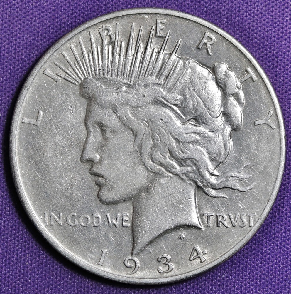 1934-d Peace Silver Dollar.  Error DDO. Dramatic Doubling Top 3 Rays RT.  209255