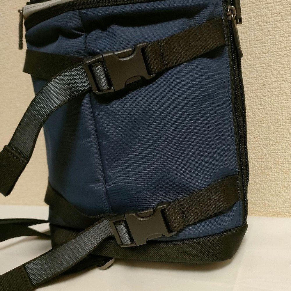 TUMI body bag slingback