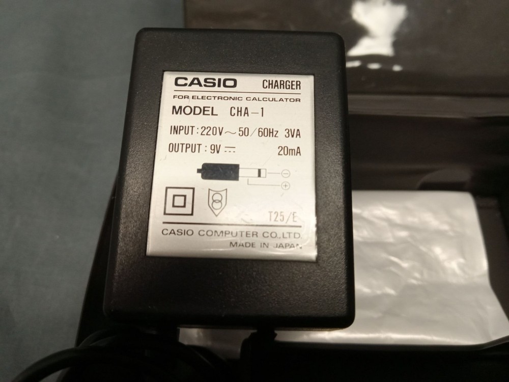 CASIO FX-820P Personal Computer With Charger Case and Manuals FULLY FUNCTIONAL!