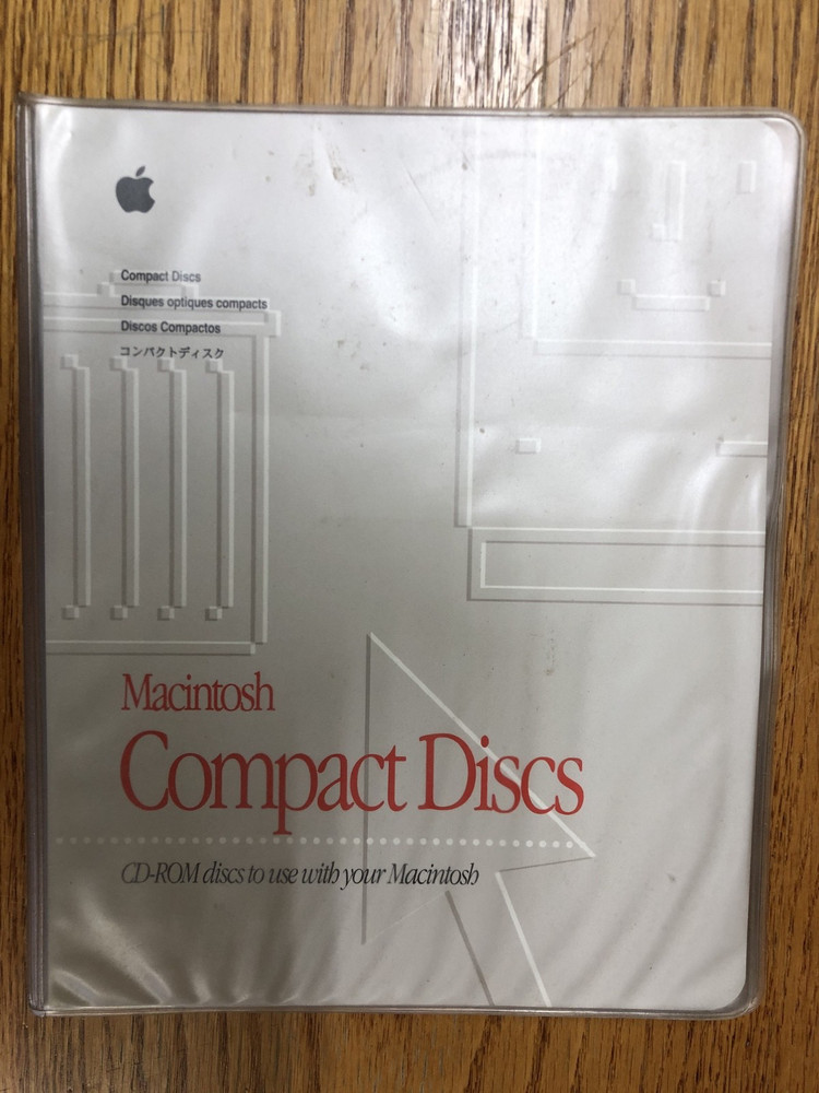 Macintosh Compact Discs Holder and random Discs / Macintosh Computer Software