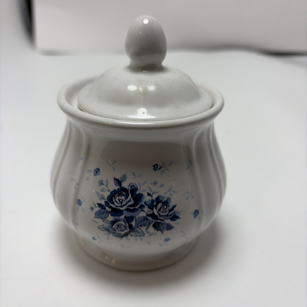White Ceramic With Blue Roses Image