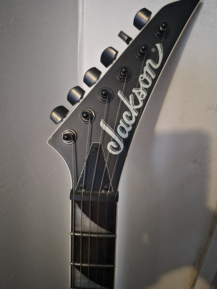 Jackson Black Solid Body Electric Guitar 6 String Right-Handed