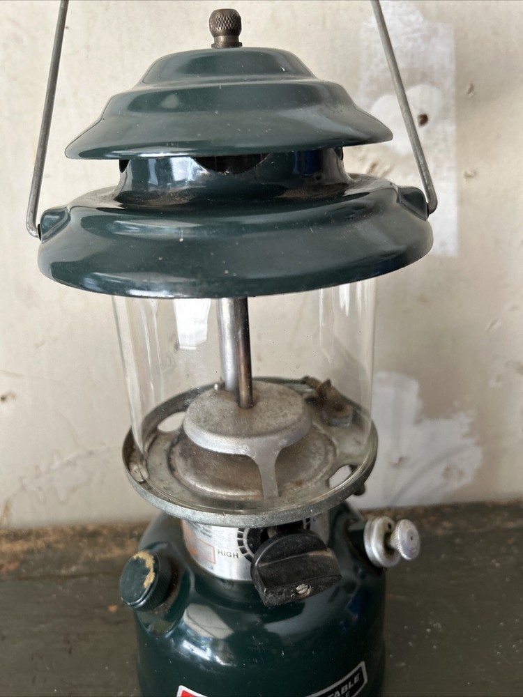 COLEMAN ADJUSTABLE TWO MANTLE LANTERN WITH Date 5-86