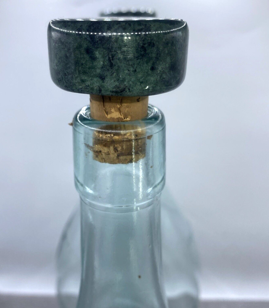Two old wine bottles - 1 Cork inside - Label Residue