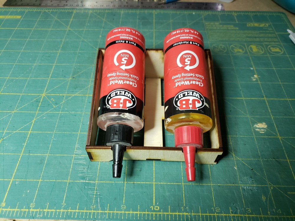 "Keep The Flow" Epoxy Bottle Holder keeps the epoxy in the nozzle between pours