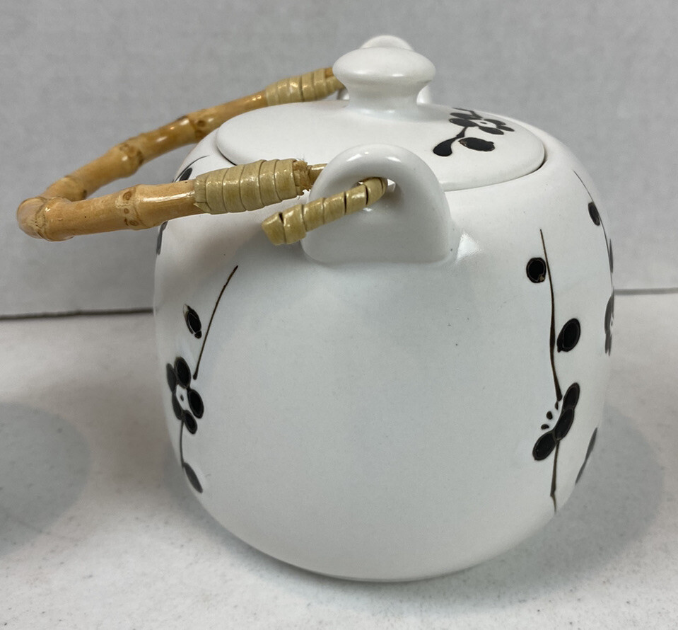 White Ceramic Teapot w Black Flowers & Two Cups Wicker Handle EUC
