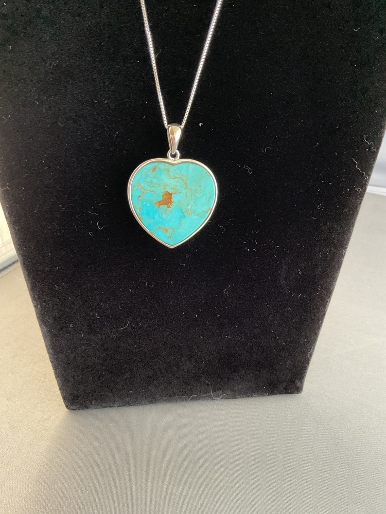 STER.LING SILVER AND TURQUOISE PENDANT