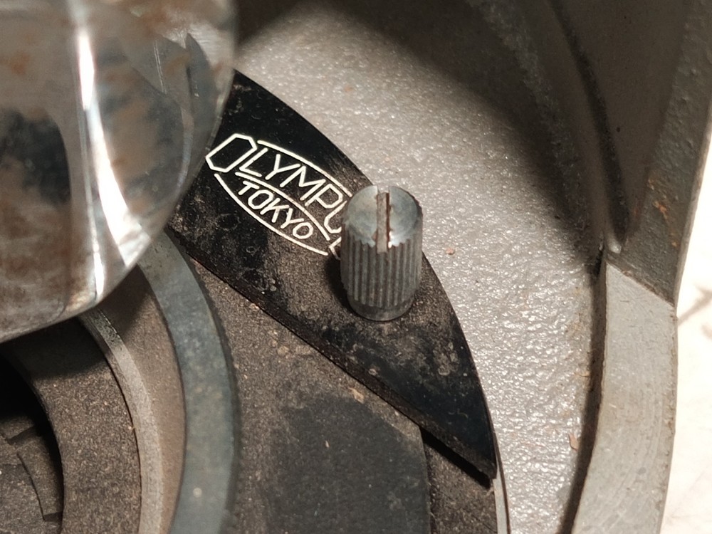 Olympus Tokyo microscope base w/ iris diaphragm, rotating stage, mirror shown