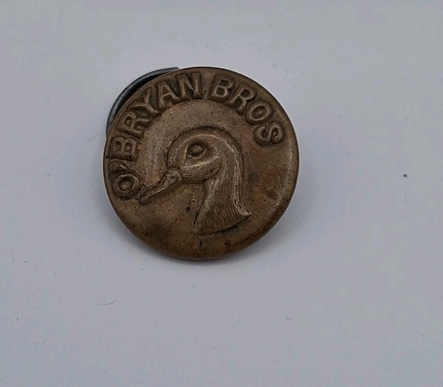 O'Bryan Bros Brass Button